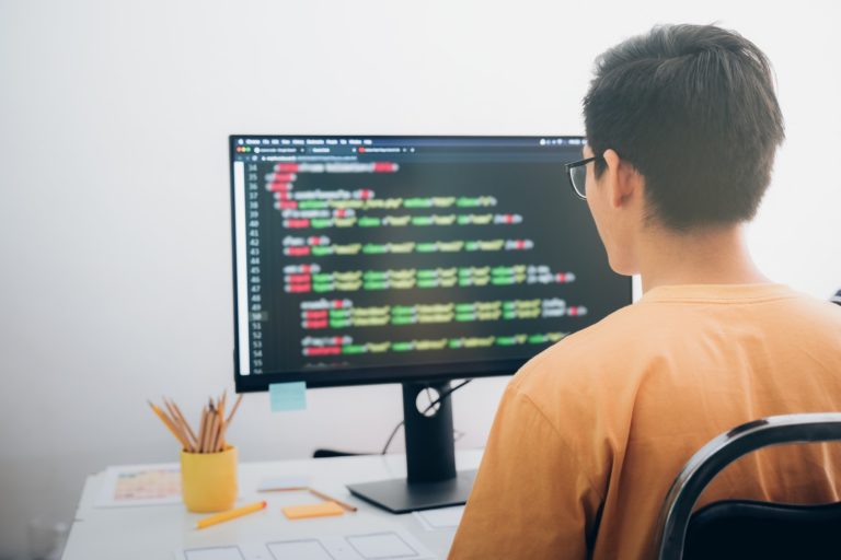 Programmers and developer teams are coding and developing software